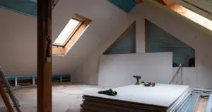 House attic insulation and renovation. Drywall construction